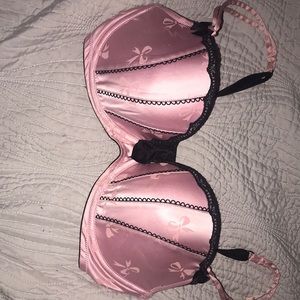 Victoria secret bra it is a 36 D it is pink and black.